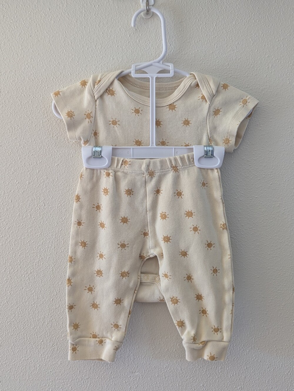 Pale Yellow Outfit With Suns